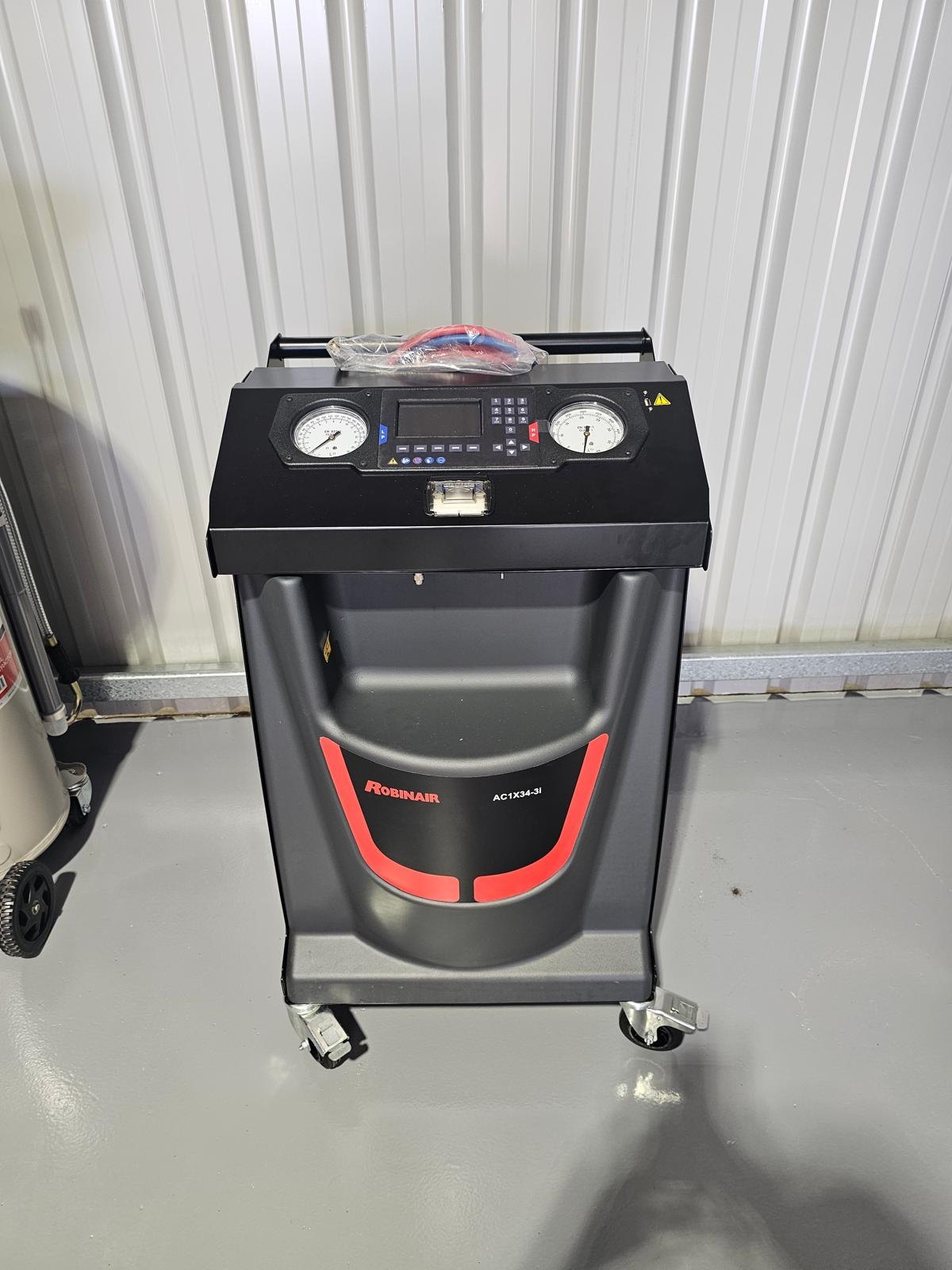 Robinair AC1X34-3i air-conditioning recovery and recharge machine in the workshop